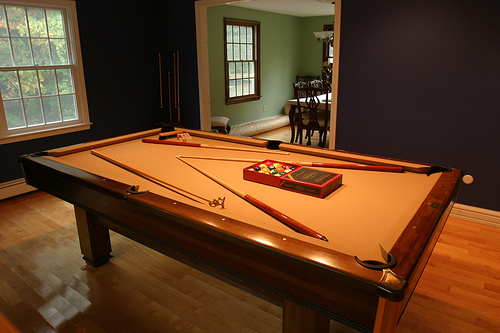 Pool Table Next to Dining Room